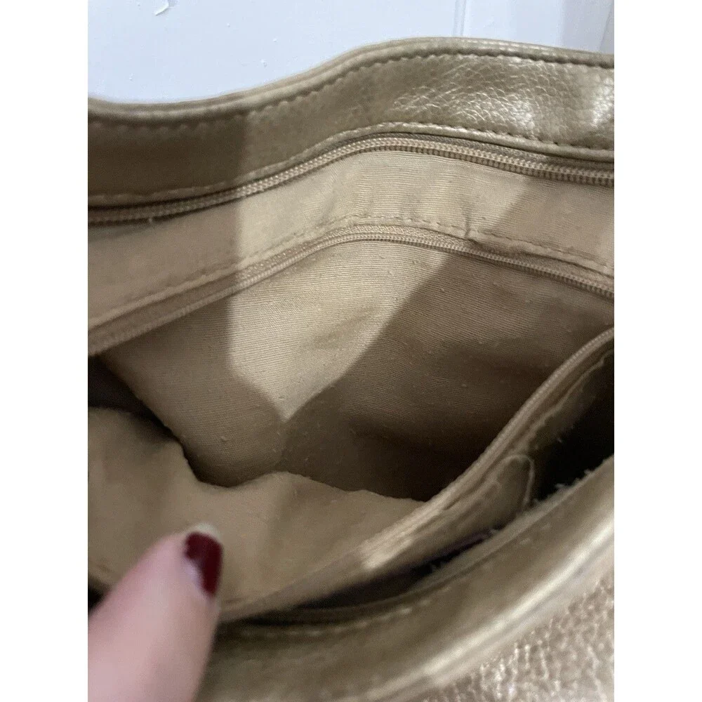 The SAK Gold Pebbled Leather Hobo Shoulder Bag Purse Single Strap Handbag